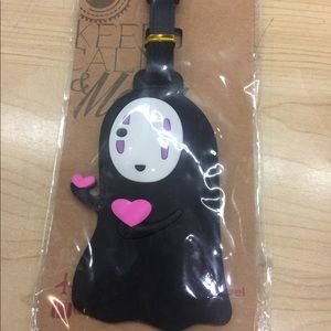 No Face Luggage Tag